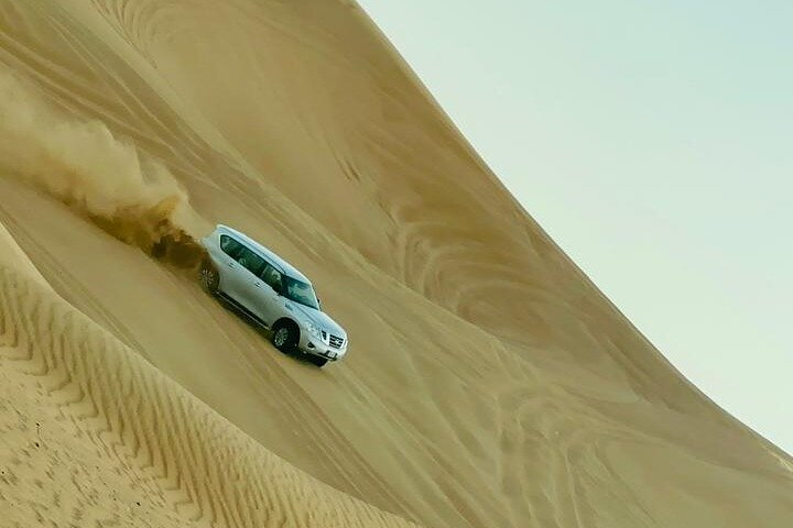 Experience the vast expanse of Dubai’s pristine deserts as you navigate the sandy dunes in your own vehicle uncovering thrilling landscapes on this unique self-drive adventure.